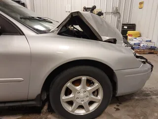 2007 Ford Taurus SEL with VIN 1FAFP56U67A104161, listed as a IAAI auction lot 41885584 with 98,919 mi miles and . Bid and sale history available at DreamBid. Image 19.
