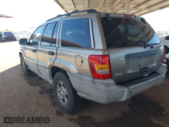 1999 Jeep Grand Cherokee Laredo with VIN 1J4G258S7XC679151, listed as a IAAI auction lot 42500706 with Not provided miles and . Bid and sale history available at DreamBid. Image 3.
