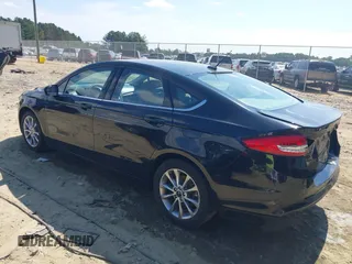 2017 Ford Fusion SE with VIN 3FA6P0H75HR391848, listed as a IAAI auction lot 40239061 with 173,515 mi miles. Bid and sale history available at carsss.com. Image 3.
