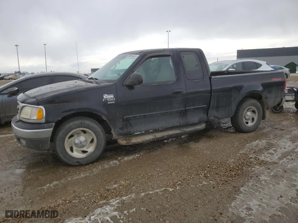 1999 Ford F-150 Work Series with VIN 2FTRX17W1XCA75215, listed as a Copart auction lot 49999465 with 312,618 mi miles and Clean Title. Bid and sale history available at carsss.com. Image 1.