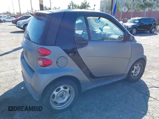 2013 Smart fortwo Pure с VIN WMEEJ3BA1DK647416, выставлен на аукционе IAAI как лот 41676693 с пробегом 102 772 миль миль и . История ставок и продаж доступна на DreamBid. Изображение 4.