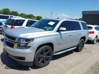 2015 Chevrolet Tahoe LT with VIN 1GNSCBKC9FR111001, listed as a IAAI auction lot 42440624 with 128,087 mi miles and . Bid and sale history available at DreamBid. Image 16.