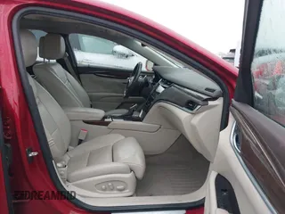 2013 Cadillac XTS Luxury with VIN 2G61P5S32D9115640, listed as a IAAI auction lot 41065284 with 125,643 mi miles and . Bid and sale history available at carsss.com. Image 5.
