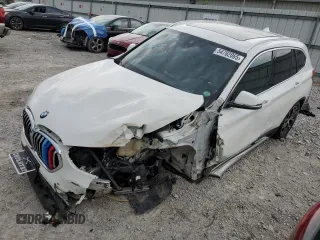 2021 BMW X1 xDrive28i with VIN WBXJG9C02M5S69998, listed as a Copart auction lot 54782065 with 48,211 mi miles and Salvage title. Bid and sale history available at DreamBid. Image 1.