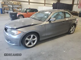 2010 BMW 1 Series 128i with VIN WBAUP7C58AVK77512, listed as a Copart auction lot 68623084 with 111,092 mi miles and Salvage Title. Bid and sale history available at carsss.com. Image 1.