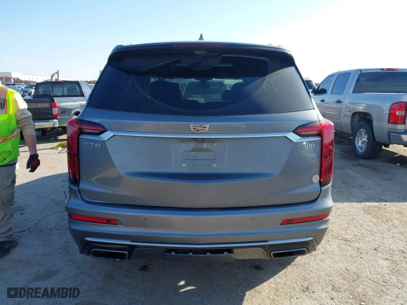 2020 Cadillac XT6 FWD Premium Luxury with VIN 1GYKPCRS8LZ129799, listed as a IAAI auction lot 41602536 with 96,865 mi miles. Bid and sale history available at carsss.com. Image 16.