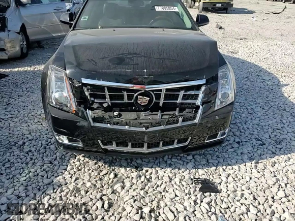 2013 Cadillac CTS Premium with VIN 1G6DS5E35D0149394, listed as a Copart auction lot 77005854 with 92,197 mi miles and Salvage title. Bid and sale history available at DreamBid. Image 11.