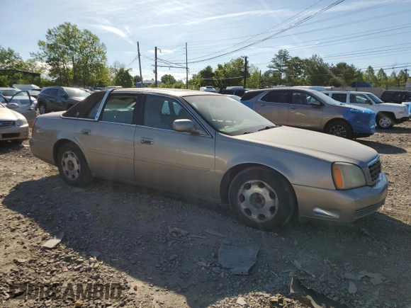2001 Cadillac DeVille DHS z VIN 1G6KE57Y21U250470, wystawiony jako Copart lot #57334785 z przebiegiem 66 703 mil mil oraz Tytuł czysty. Historia ofert i sprzedaży dostępna na DreamBid. Obrazek 4.