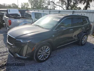 2021 Cadillac XT6 Premium Luxury with VIN 1GYKPCRS1MZ199288, listed as a Copart auction lot 54264995 with 51,432 mi miles and Salvage Title. Bid and sale history available at carsss.com. Image 1.