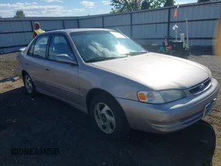 1999 Toyota Corolla VE z VIN 1NXBR18E3XZ207078, wystawiony jako IAAI lot #42194981 z przebiegiem 112 584 mil mil oraz . Historia ofert i sprzedaży dostępna na DreamBid. Obrazek 1.