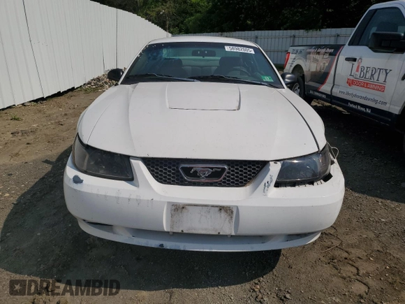2003 Ford Mustang Standard z VIN 1FAFP40423F337129, wystawiony jako Copart lot #58982005 z przebiegiem 196 277 mil mil oraz Szkoda całkowita • Salvage title. Historia ofert i sprzedaży dostępna na DreamBid. Obrazek 5.