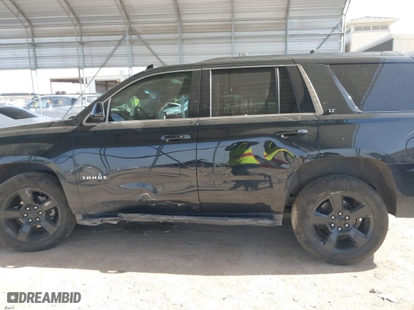 2019 Chevrolet Tahoe LT with VIN 1GNSCBKC0KR328639, listed as a IAAI auction lot 41740284 with 111,734 mi miles. Bid and sale history available at carsss.com. Image 15.