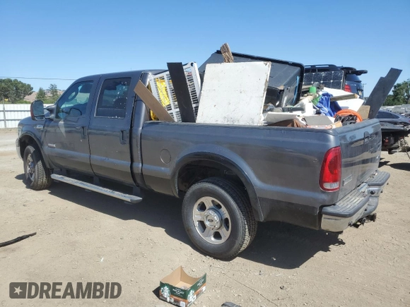 2007 Ford F-250 XL with VIN 1FTSW21P57EA59900, listed as a Copart auction lot 58787085 with 216,385 mi miles and Salvage title. Bid and sale history available at DreamBid. Image 2.