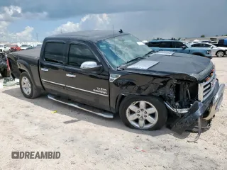 2013 GMC Sierra 1500 SLE with VIN 3GTP1VE0XDG355146, listed as a Copart auction lot 61967045 with 99,095 mi miles and Salvage title. Bid and sale history available at DreamBid. Image 4.