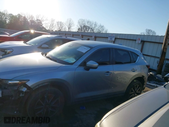 2018 Mazda CX-5 Touring with VIN JM3KFBCM6J0363767, listed as a IAAI auction lot 41776614 with 139,507 mi miles. Bid and sale history available at carsss.com. Image 14.