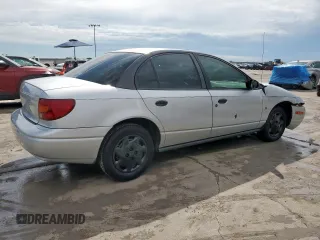2002 Saturn SL с VIN 1G8ZH52892Z242469, выставлен на аукционе Copart как лот 59973755 с пробегом Не указан миль и Списание • Salvage title. История ставок и продаж доступна на DreamBid. Изображение 3.
