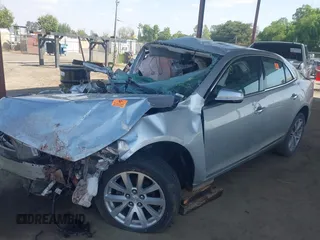 2016 Chevrolet Malibu LTZ with VIN 1G11E5SA5GF138173, listed as a IAAI auction lot 42057413 with 85,165 mi miles and . Bid and sale history available at DreamBid. Image 2.