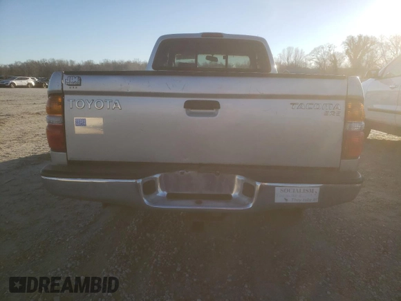 2004 Toyota Tacoma z VIN 5TEVL52N74Z390717, wystawiony jako Copart lot #45209015 z przebiegiem 187 005 mil mil oraz Szkoda całkowita • Salvage title. Historia ofert i sprzedaży dostępna na DreamBid. Obrazek 6.
