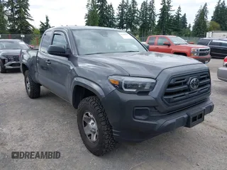 2019 Toyota Tacoma SR with VIN 5TFSX5EN2KX065996, listed as a IAAI auction lot 42709428 with 64,173 mi miles and . Bid and sale history available at DreamBid. Image 1.
