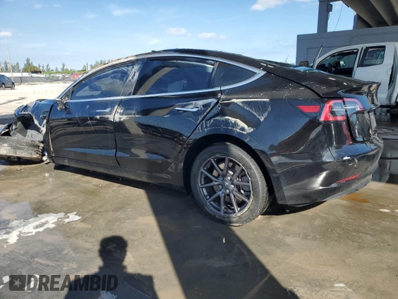 2019 Tesla Model 3 Mid Range with VIN 5YJ3E1EA5KF298099, listed as a Copart auction lot 42227475 with Not Provided miles and Non Repairable. Bid and sale history available at DreamBid. Image 2.