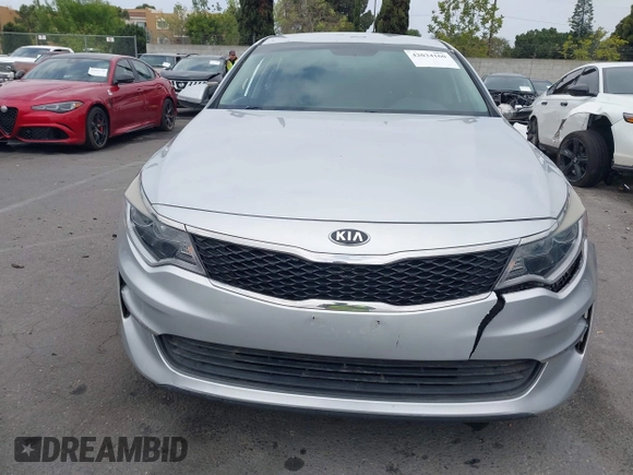 2016 Kia Optima LX with VIN 5XXGT4L34GG023812, listed as a IAAI auction lot 42034160 with 96,720 mi miles and . Bid and sale history available at DreamBid. Image 12.