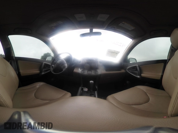 2010 Toyota RAV4 Limited z VIN JTMDF4DVXA5027336, wystawiony jako IAAI lot #42264028 z przebiegiem 118 122 mil mil oraz . Historia ofert i sprzedaży dostępna na DreamBid. Obrazek 17.