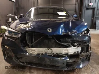 2022 BMW X6 M50i z VIN 5UXCY8C05N9J70601, wystawiony jako IAAI lot #42344397 z przebiegiem 49 085 mil mil oraz . Historia ofert i sprzedaży dostępna na DreamBid. Obrazek 12.