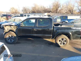 2016 Toyota Tacoma SR with VIN 3TMCZ5AN0GM023263, listed as a IAAI auction lot 41302069 with 137,276 mi miles and . Bid and sale history available at DreamBid. Image 15.