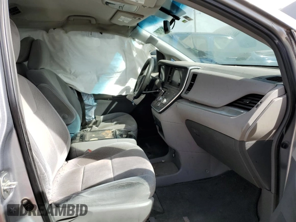2015 Toyota Sienna LE AAS with VIN 5TDKK3DC7FS652662, listed as a Copart auction lot 49272325 with 129,652 mi miles and Salvage Title. Bid and sale history available at DreamBid. Image 7.