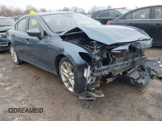 2014 Mazda 6 i Touring with VIN JM1GJ1T53E1112768, listed as a IAAI auction lot 41727440 with 166,081 mi miles and . Bid and sale history available at DreamBid. Image 1.