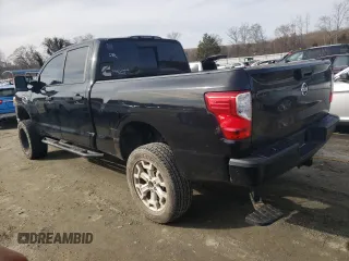 2017 Nissan Titan XD SV with VIN 1N6BA1F49HN556566, listed as a Copart auction lot 85102544 with 157,065 mi miles and Clean Title. Bid and sale history available at carsss.com. Image 2.