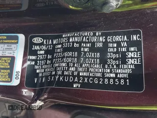 2012 Kia Sorento EX with VIN 5XYKUDA2XCG288581, listed as a IAAI auction lot 42011463 with 449,858 mi miles. Bid and sale history available at carsss.com. Image 9.