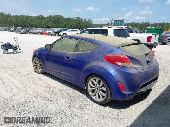 2012 Hyundai Veloster w/Gray Int with VIN KMHTC6AD7CU050444, listed as a IAAI auction lot 42170272 with 121,478 mi miles and . Bid and sale history available at DreamBid. Image 3.
