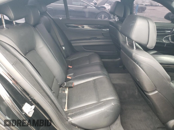 2013 BMW 7 Series 740Li with VIN WBAYE4C51DD137687, listed as a Copart auction lot 76103944 with 134,609 mi miles and Salvage title. Bid and sale history available at DreamBid. Image 10.