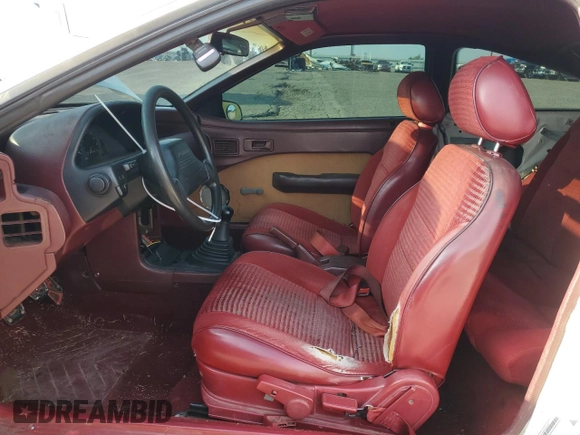 1990 Ford Probe GL z VIN 1ZVPT20CXL5212307, wystawiony jako Copart lot #54941994 z przebiegiem 241 227 mil mil oraz Szkoda całkowita • Salvage title. Historia ofert i sprzedaży dostępna na DreamBid. Obrazek 7.