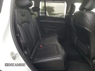 2023 Jeep Grand Cherokee Limited with VIN 1C4RJHBG2P8910144, listed as a Copart auction lot 57204435 with 18,016 mi miles and Salvage title. Bid and sale history available at DreamBid. Image 11.