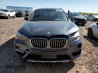 2017 BMW X1 xDrive28i with VIN WBXHT3C32H5F79403, listed as a Copart auction lot 50182775 with 71,003 mi miles and Salvage Title. Bid and sale history available at carsss.com. Image 5.