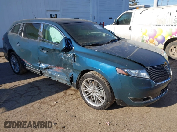 2016 Lincoln MKT EcoBoost z VIN 2LMHJ5AT4GBL02910, wystawiony jako IAAI lot #41192092 z przebiegiem 76 999 mil mil oraz . Historia ofert i sprzedaży dostępna na DreamBid. Obrazek 1.