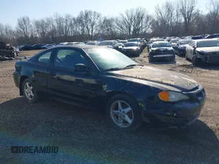1999 Pontiac Grand Am GT z VIN 1G2NW12E5XM940790, wystawiony jako IAAI lot #38323559 z przebiegiem 69 244 mil mil oraz . Historia ofert i sprzedaży dostępna na DreamBid. Obrazek 1.
