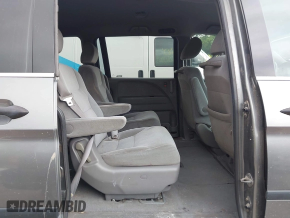 2009 Honda Odyssey LX with VIN 5FNRL38269B043326, listed as a IAAI auction lot 42872714 with 235,087 mi miles and . Bid and sale history available at DreamBid. Image 8.