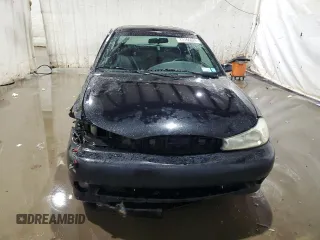1998 Ford Contour z VIN 1FAFP68GXWK272570, wystawiony jako Copart lot #73166024 z przebiegiem 315 249 mil mil oraz Szkody całkowita. Historia ofert i sprzedaży dostępna na DreamBid. Obrazek 5.