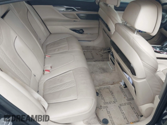 2016 BMW 7 Series 750i xDrive with VIN WBA7F2C58GG418482, listed as a IAAI auction lot 41931831 with 97,776 mi miles and . Bid and sale history available at DreamBid. Image 8.