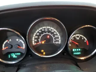 2010 Dodge Caliber Mainstreet z VIN 1B3CB3HAXAD551716, wystawiony jako Copart lot #77349503 z przebiegiem 144 209 mil mil oraz Tytuł czysty. Historia ofert i sprzedaży dostępna na DreamBid. Obrazek 9.