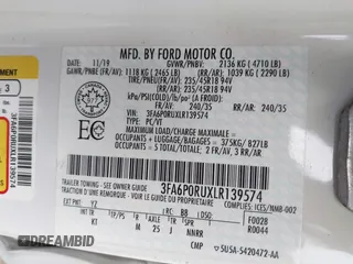 2020 Ford Fusion Titanium with VIN 3FA6P0RUXLR139574, listed as a IAAI auction lot 42299070 with 92,751 mi miles and . Bid and sale history available at DreamBid. Image 9.