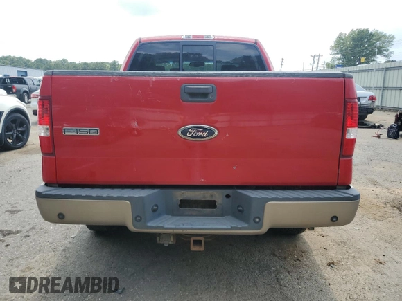 2004 Ford F-150 XLT with VIN 1FTPW14504KD65703, listed as a Copart auction lot 58792215 with 303,083 mi miles and Salvage title. Bid and sale history available at DreamBid. Image 6.