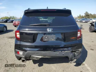 2022 Honda Passport TrailSport with VIN 5FNYF8H6XNB003764, listed as a Copart auction lot 56180195 with 61,515 mi miles and Salvage title. Bid and sale history available at DreamBid. Image 6.