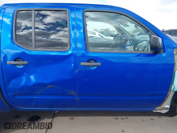 2014 Nissan Frontier SV with VIN 1N6AD0ER1EN765693, listed as a IAAI auction lot 41560914 with 165,572 mi miles and . Bid and sale history available at DreamBid. Image 14.