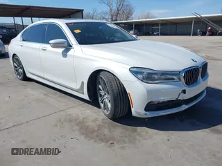 2018 BMW 7 Series 750i with VIN WBA7F0C57JGM23667, listed as a IAAI auction lot 41581035 with 113,140 mi miles and . Bid and sale history available at DreamBid. Image 1.