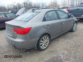 2010 Kia Forte SX with VIN KNAFW4A31A5048066, listed as a IAAI auction lot 42102810 with 160,998 mi miles. Bid and sale history available at carsss.com. Image 4.