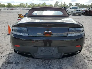 2013 Aston Martin Vantage z VIN SCFEKBBK1DGD17118, wystawiony jako Copart lot #60636224 z przebiegiem 50 591 mil mil oraz Szkody całkowita. Historia ofert i sprzedaży dostępna na DreamBid. Obrazek 10.